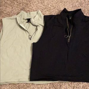 TWO zip crop tops